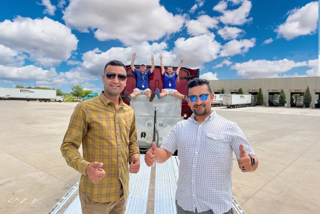 Pedigree Trailer Salesmen with customers on a Flatbed Trailer