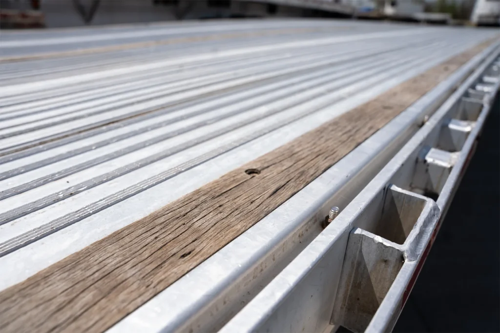 Used Reitnouer All Aluminum Stepdeck Semi Trailers with full length 3" wood nailers