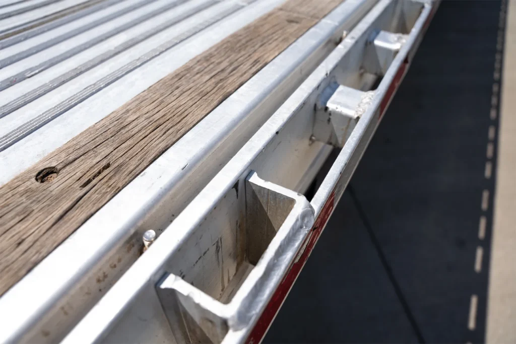 Used Reitnouer All Aluminum Stepdeck Semi Trailers with full length 3" wood nailers