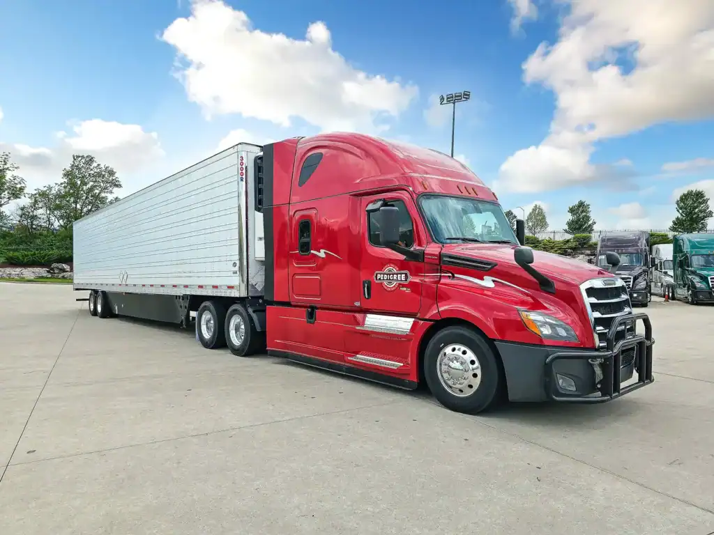 Used Red Freightliner Cascadia and Used Reefer Trailer from Pedigree Truck and Trailer Sales