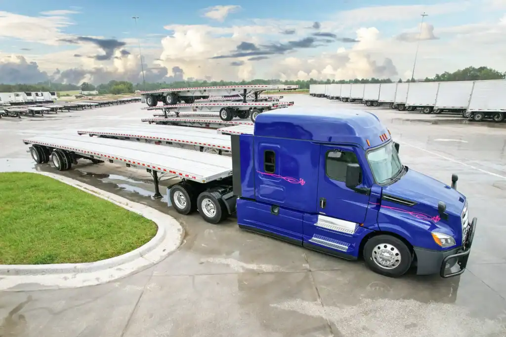 Used Semi Truck and 53' all aluminum flatbed trailer at pedigree truck and trailer sales in pittston pennsylvania